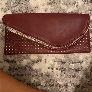 Maroon leather/cheetah print clutch